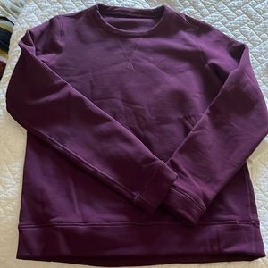 Lululemon purple sweater.  Tags were removed. Fits size 6 or S/M.